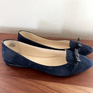 Navy suede flats with accent leather bow